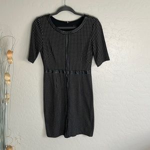 Petite Black work dress with stars in details. Trimmed in faux leather. Size 4P